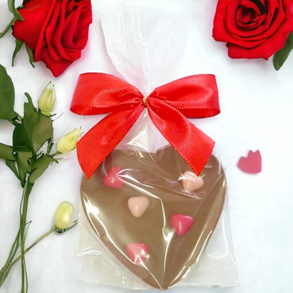 Schokoladenherz Vollmilch mit Herzen in Geschenktüte